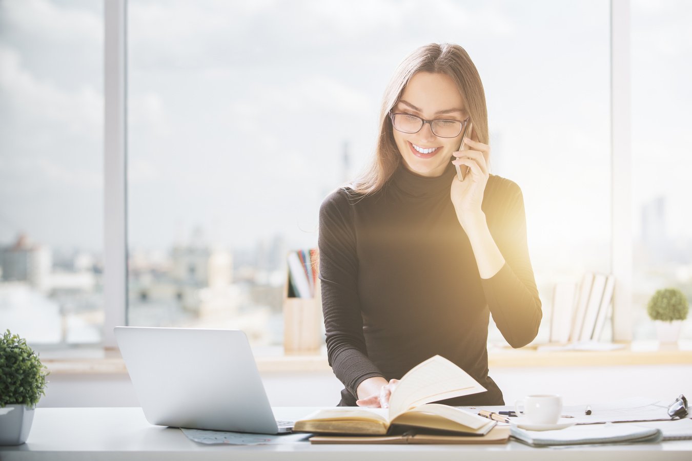 Happy woman working in office